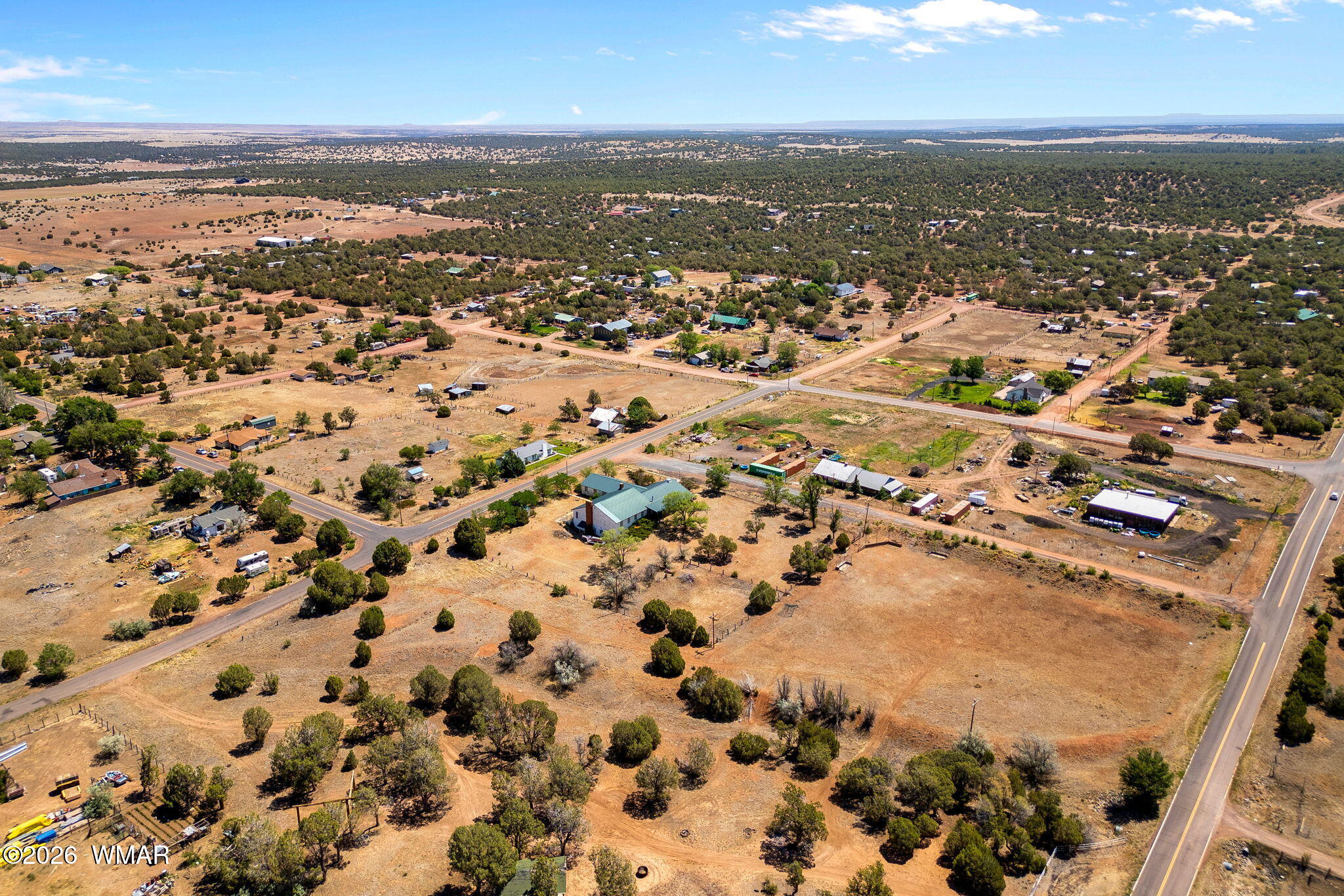 2116 Marble Road Clay Springs, AZ 85923 - Photo 17 of 48 an aerial view of residential building with parking space