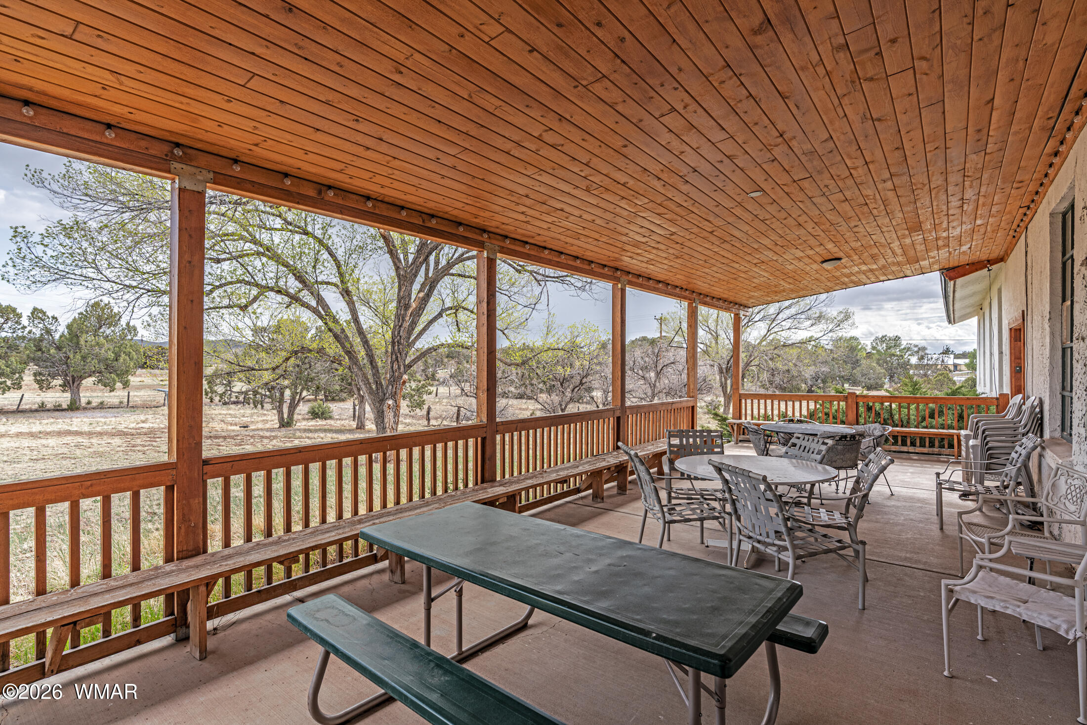 2116 Marble Road Clay Springs, AZ 85923 - Photo 42 of 48 a view of a balcony with furniture and wooden deck
