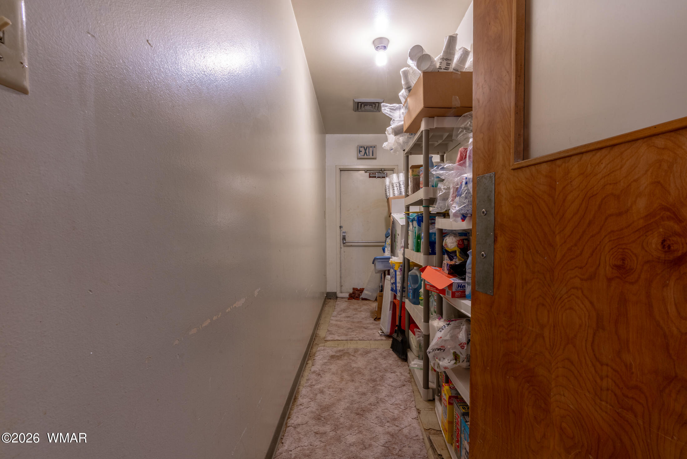 2116 Marble Road Clay Springs, AZ 85923 - Photo 44 of 48 a view of a hallway with a table and chairs