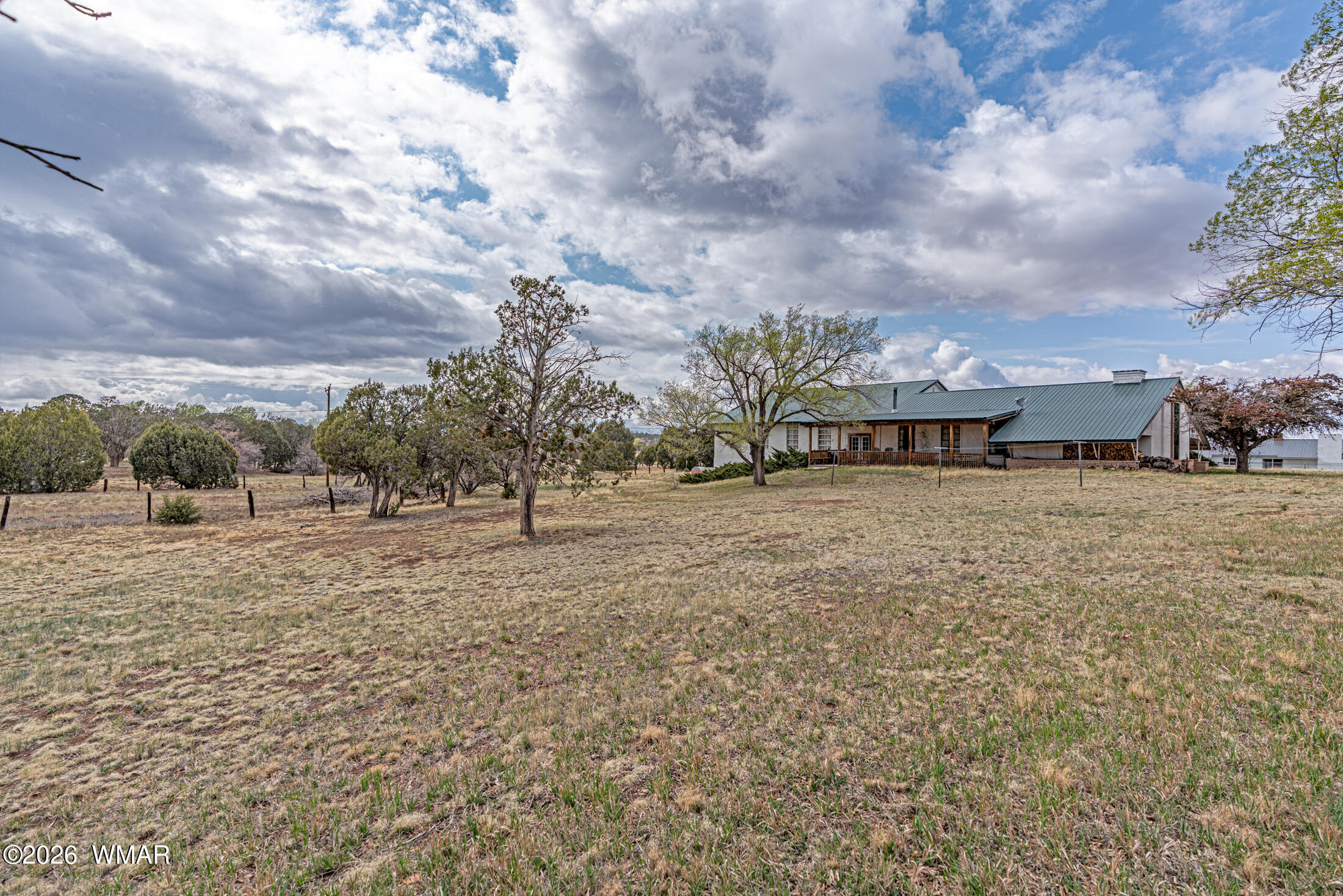 2116 Marble Road Clay Springs, AZ 85923 - Photo 5 of 48 a view of a house with a yard