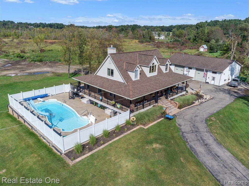 902 West Coon Lake Road Howell, MI 48843 - Photo 1 of 58