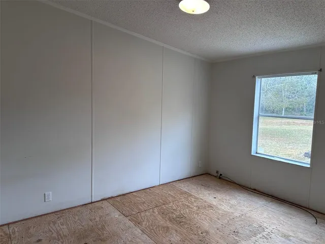 a bathroom with a toilet and a bathtub