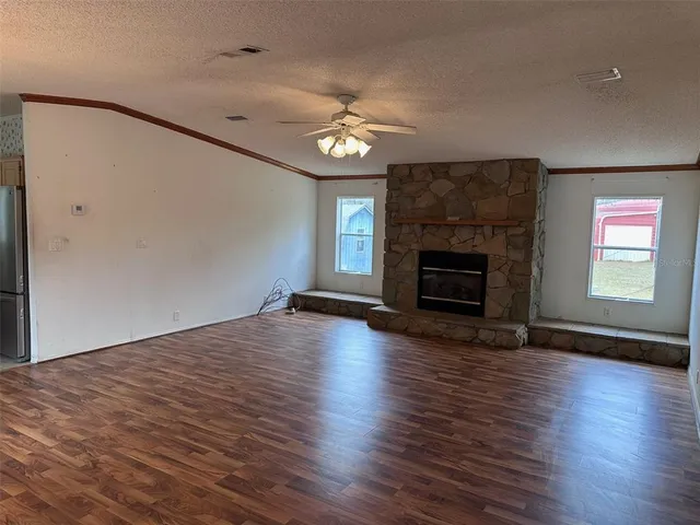 a living room with a fireplace