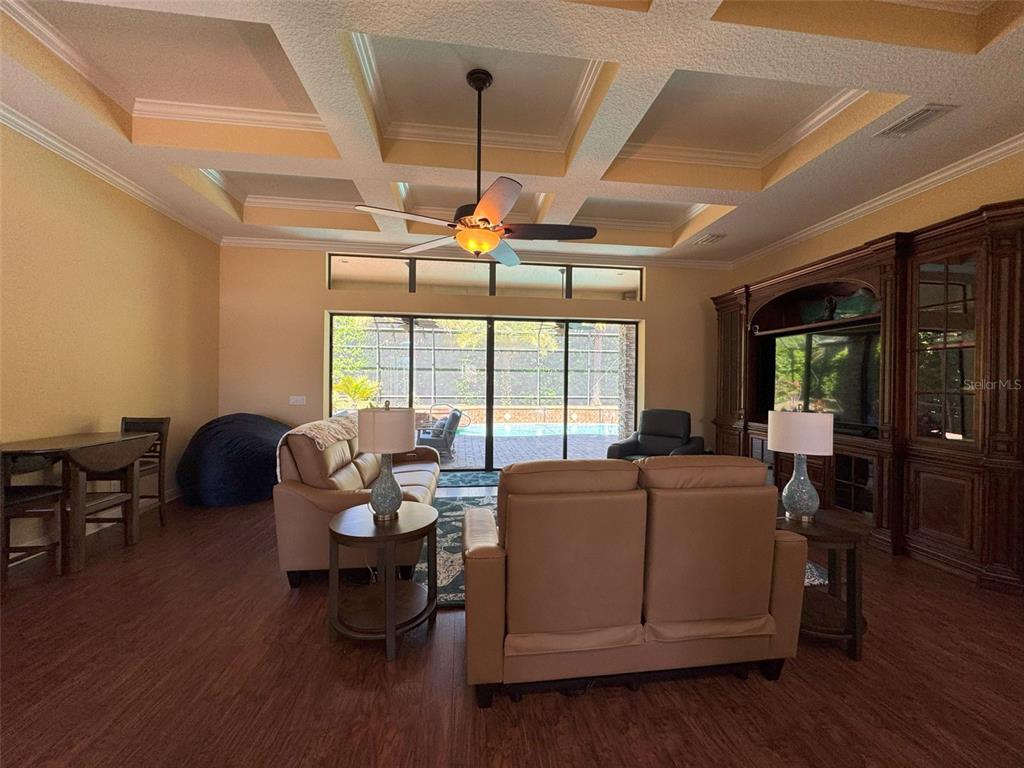 1024 West Beagle Run Loop Hernando, FL 34442 - Photo 7 of 44 a living room with furniture and a large window