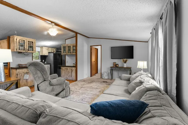 a bedroom with a bed and a cabinets