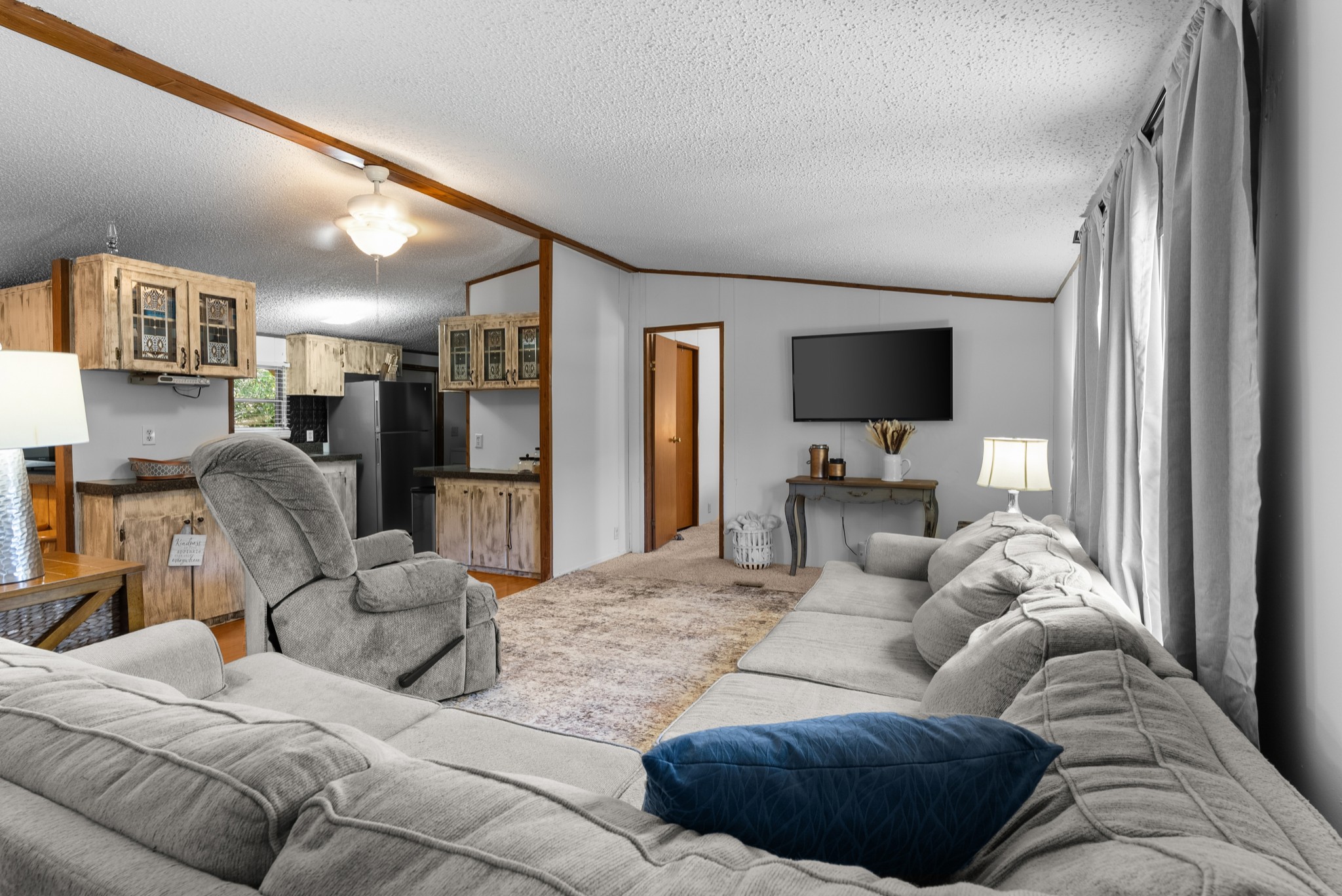 5147 Wiley Hollow Road Culleoka, TN 38451 - Photo 12 of 29 a living room with furniture and a flat screen tv