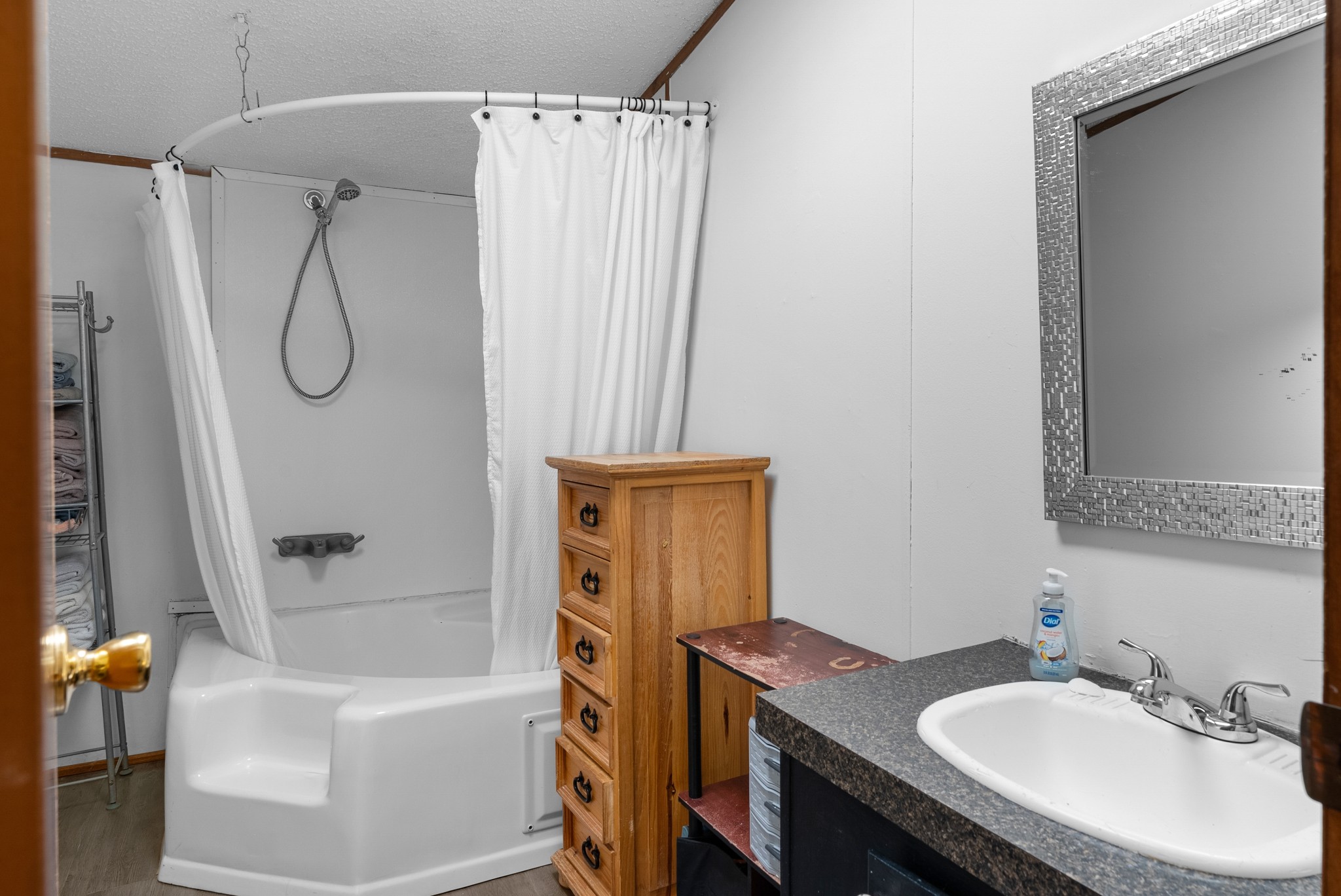 5147 Wiley Hollow Road Culleoka, TN 38451 - Photo 15 of 29 a bathroom with a granite countertop sink and a mirror