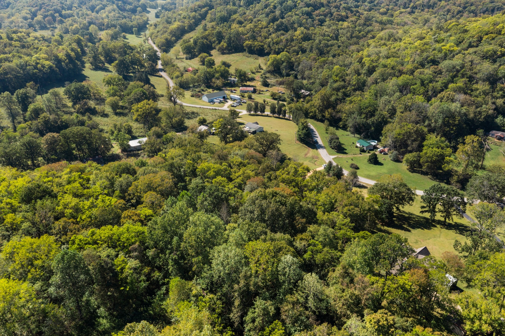 5147 Wiley Hollow Road Culleoka, TN 38451 - Photo 26 of 29 an aerial view of residential house with parking and trees