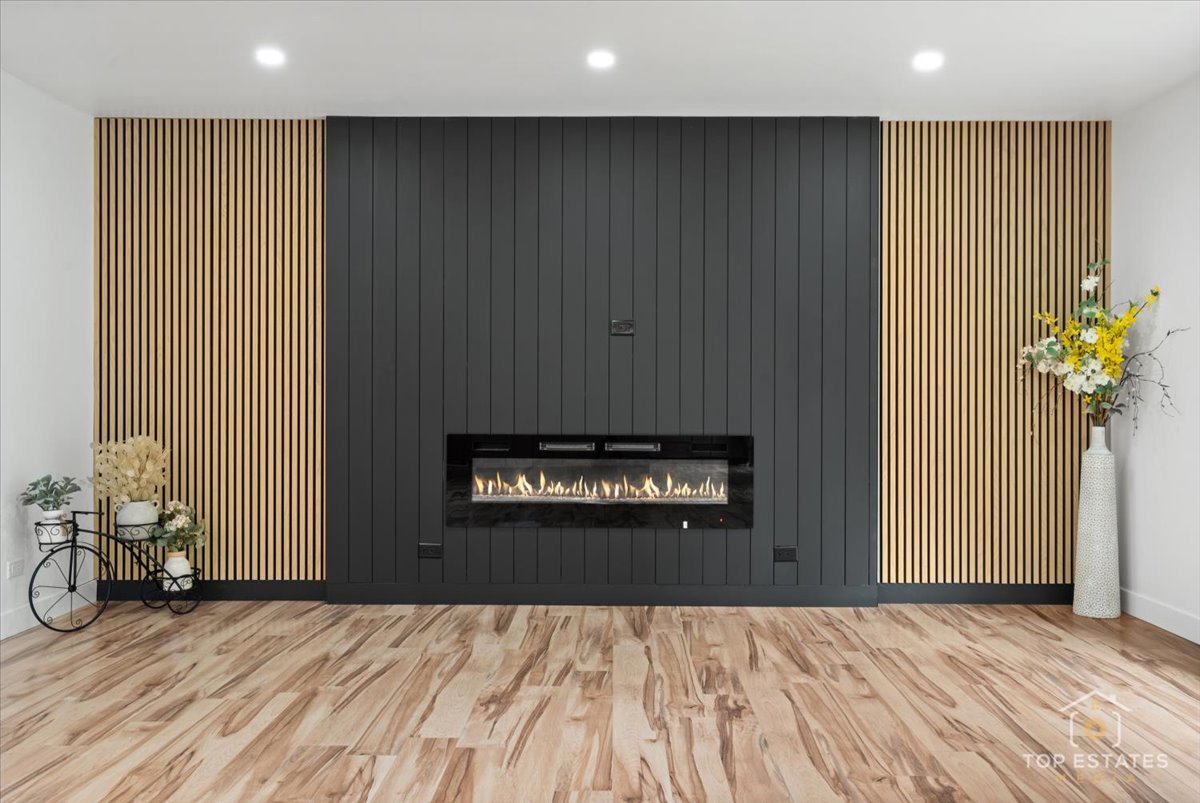 1327 Churchill Road Schaumburg, IL 60169 - Photo 18 of 71 a view of a livingroom with a couch