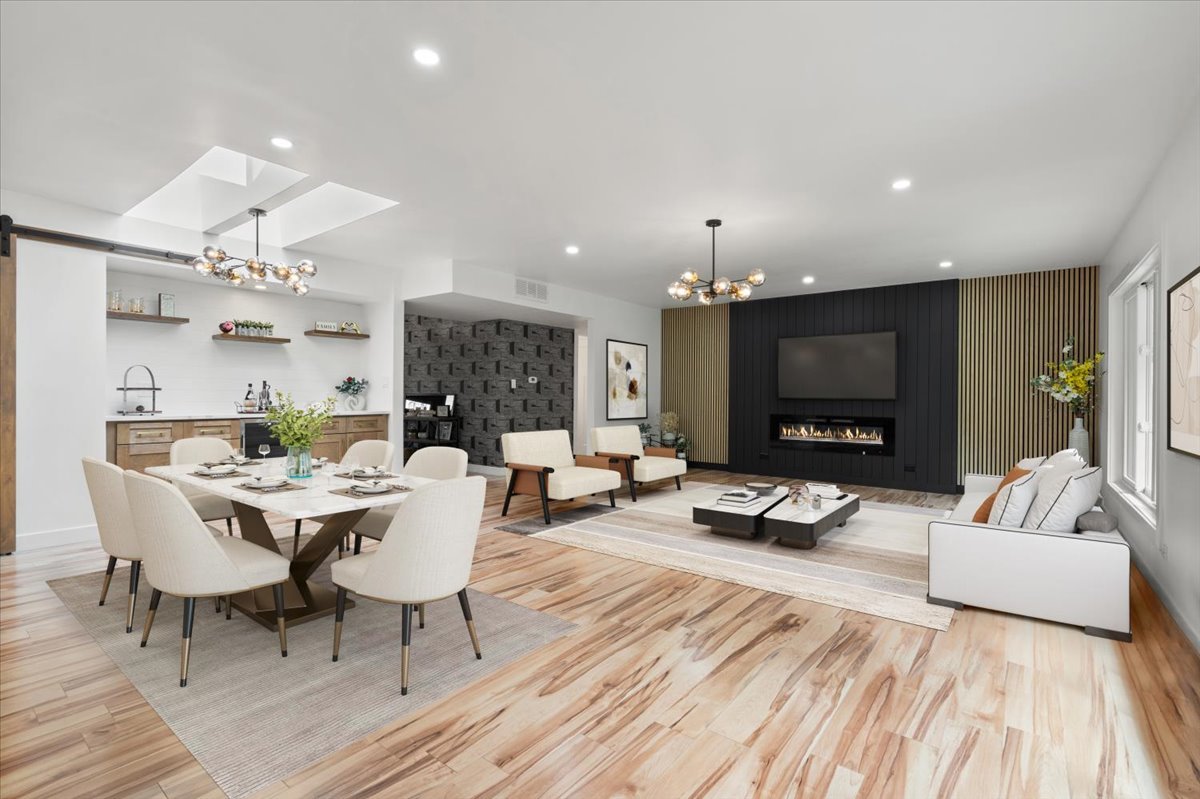 1327 Churchill Road Schaumburg, IL 60169 - Photo 21 of 71 a living room with furniture a flat screen tv and a fireplace