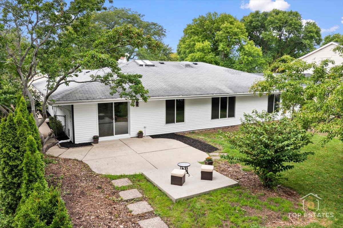 1327 Churchill Road Schaumburg, IL 60169 - Photo 61 of 71 a view of a house with a yard and large tree