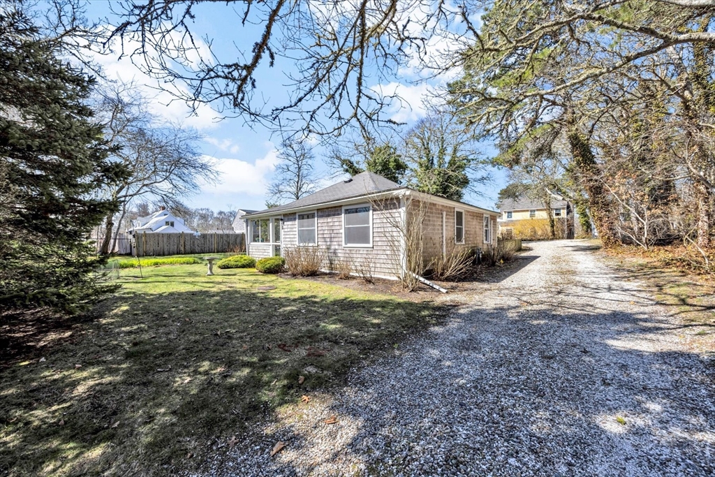 9 Jason Lane Harwich, MA 02646 - Photo 2 of 37 a view of a house with a yard