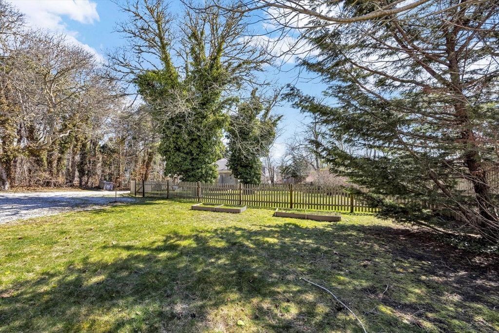9 Jason Lane Harwich, MA 02646 - Photo 34 of 37 a view of swimming pool with large trees and a big yard