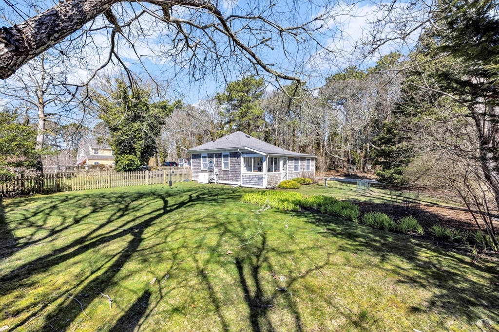 9 Jason Lane Harwich, MA 02646 - Photo 4 of 37 a view of a house with a yard