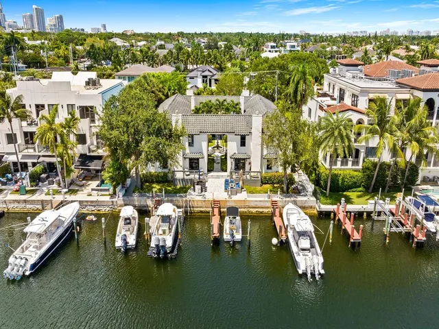 a view of houses with outdoor space and lake view