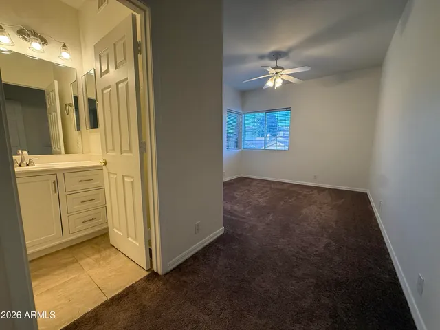 a view of a hallway with closet