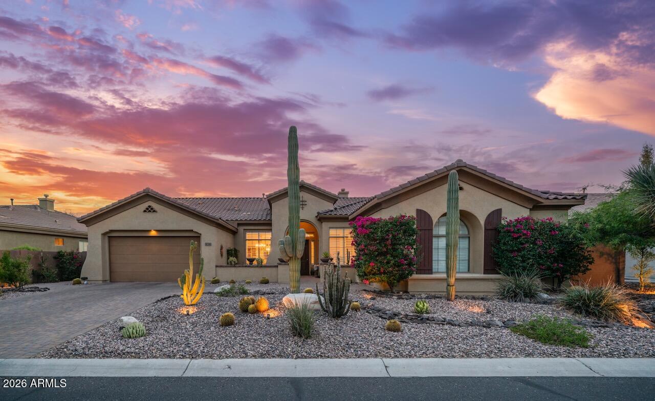 40316 North Lytham Way Phoenix, AZ 85086 - Photo 5 of 66 a front view of a house with garden