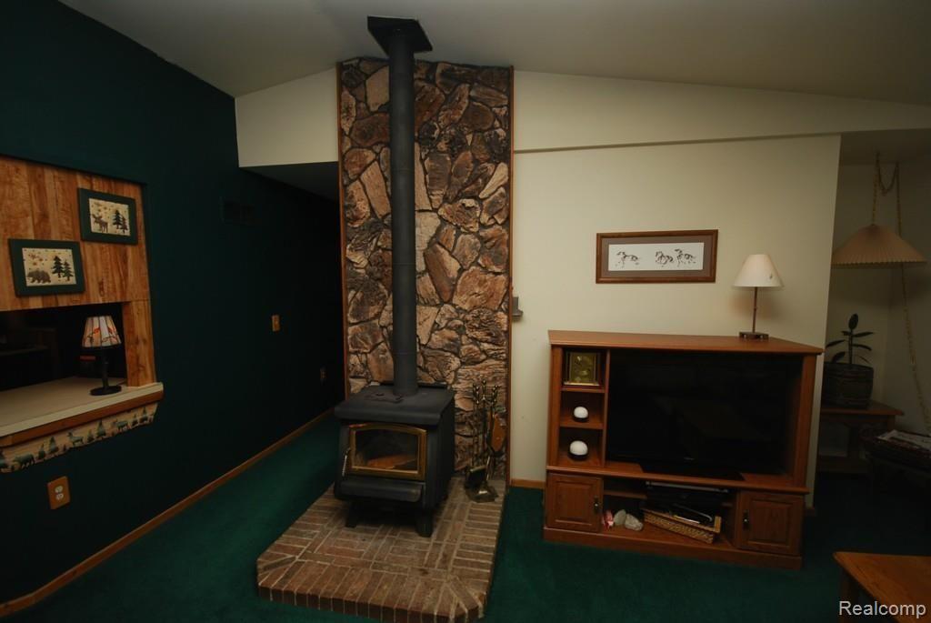 3765 Curdy Road Howell, MI 48855 - Photo 6 of 38 Wood stove