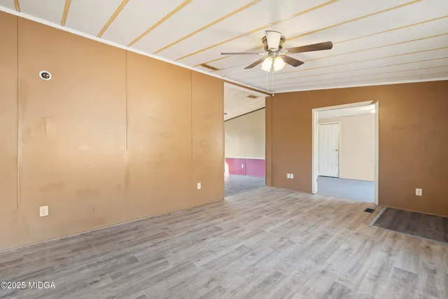 a view of an empty room and window