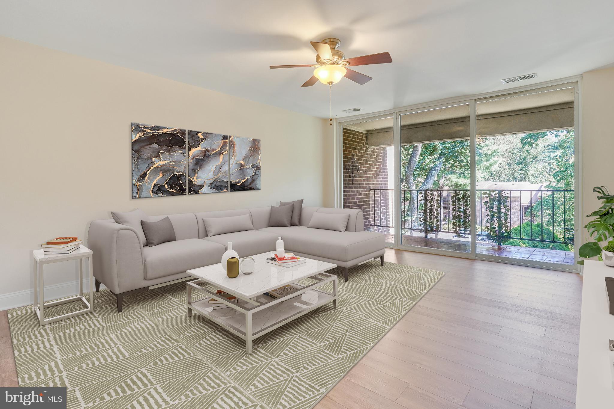 1439 Northgate Square, Unit 39/21B Reston, VA 20190 - Photo 2 of 23 a living room with furniture and a large window with garden view