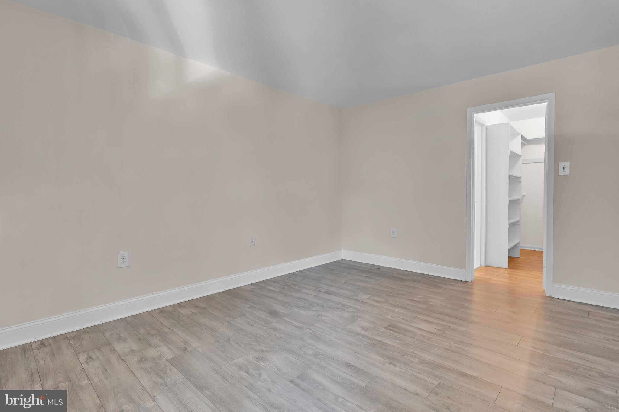 1439 Northgate Square, Unit 39/21B Reston, VA 20190 - Photo 6 of 23 a view of an empty room and wooden floor