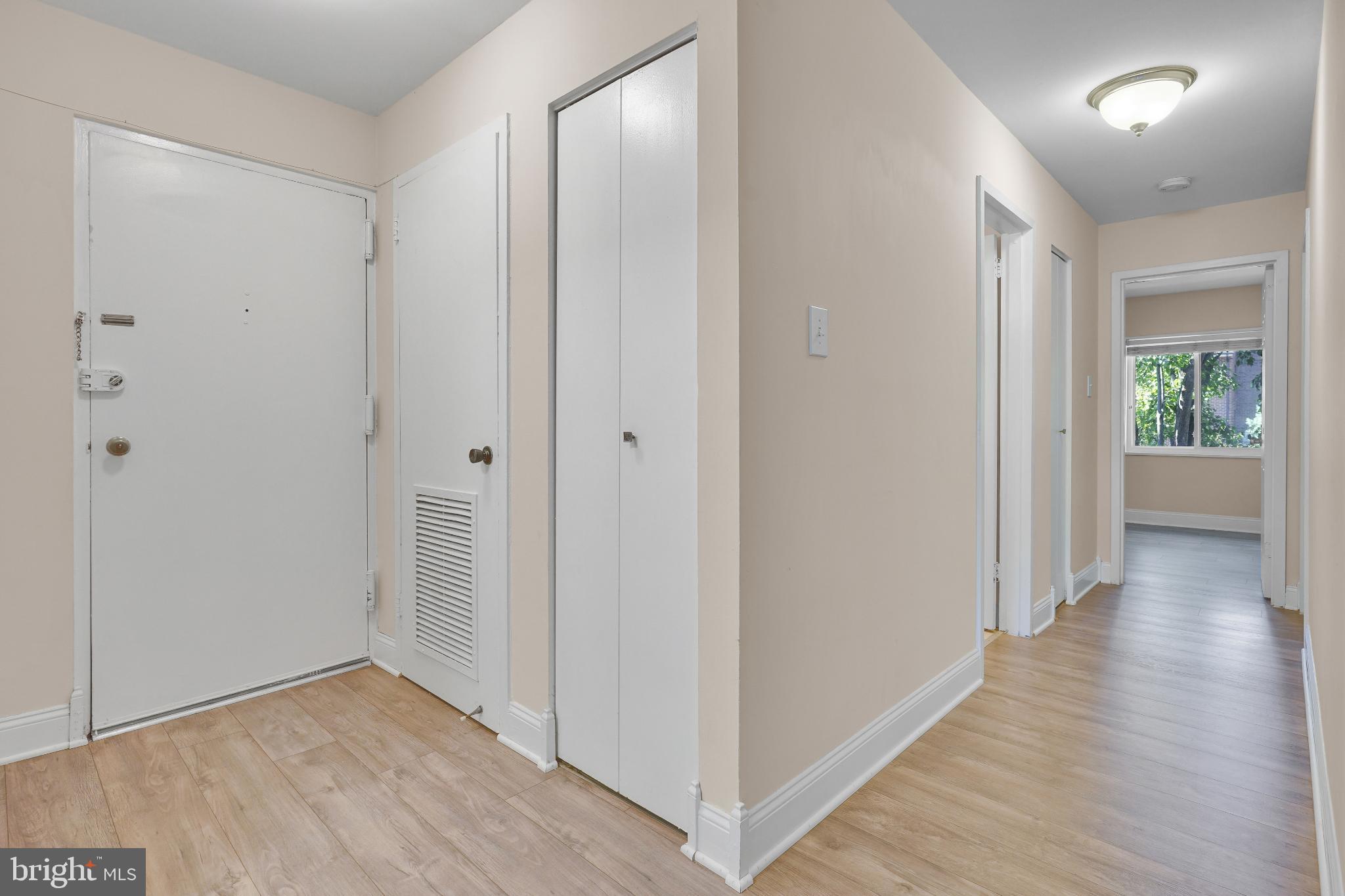 1439 Northgate Square, Unit 39/21B Reston, VA 20190 - Photo 10 of 23 a view of a hallway with wooden floor