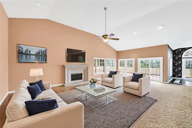 a kitchen with stainless steel appliances granite countertop a sink and a stove
