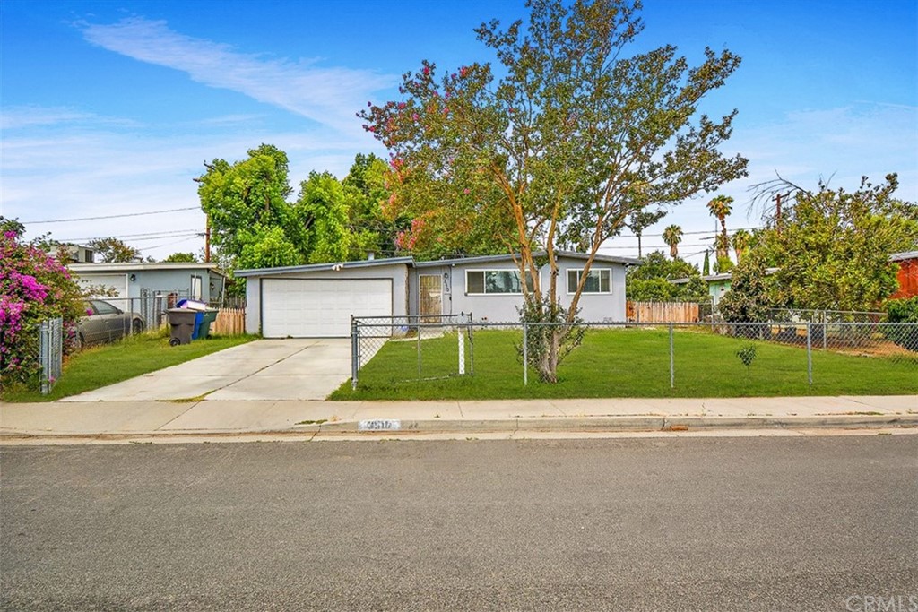 front view of a house with a small yard
