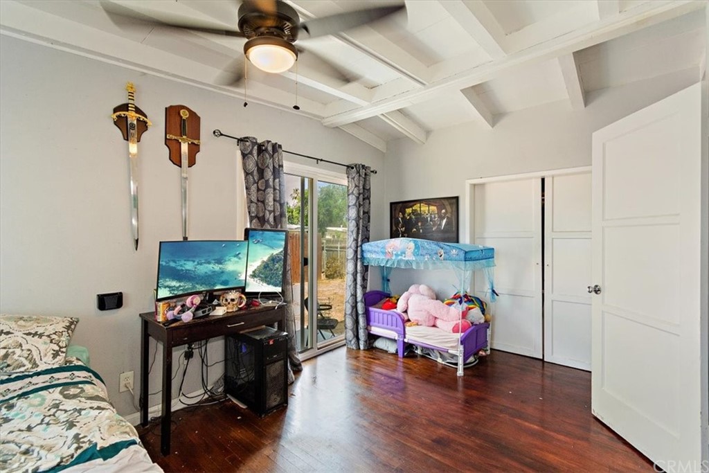 3510 McKenzie Street Riverside, CA 92503 - Photo 18 of 27 a bedroom with furniture and a bed