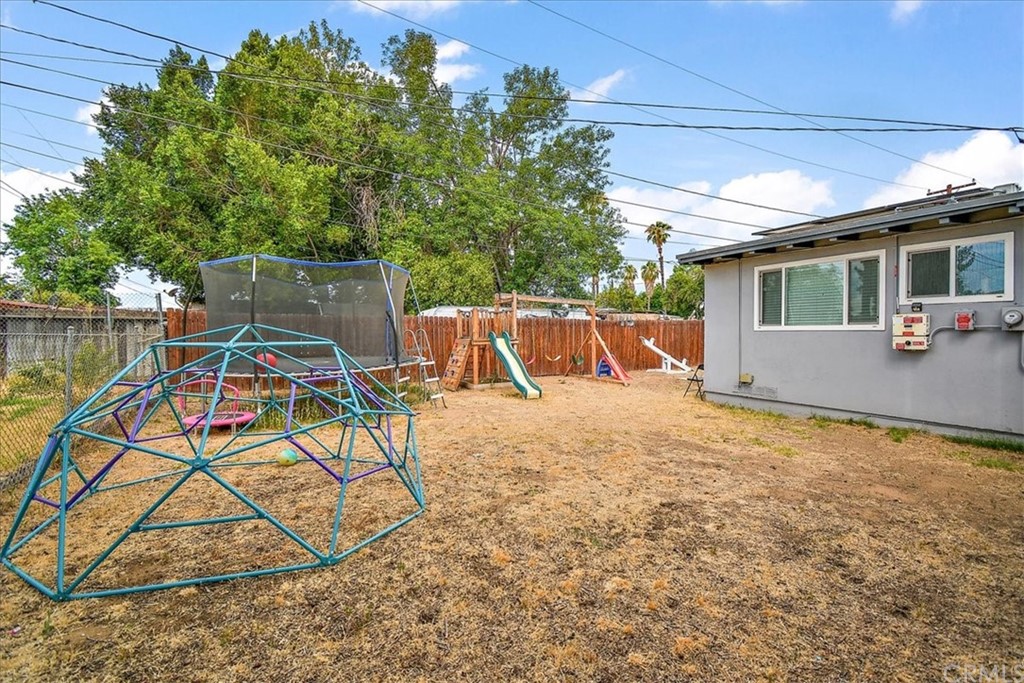 3510 McKenzie Street Riverside, CA 92503 - Photo 21 of 27 a patio with a yard table and chairs