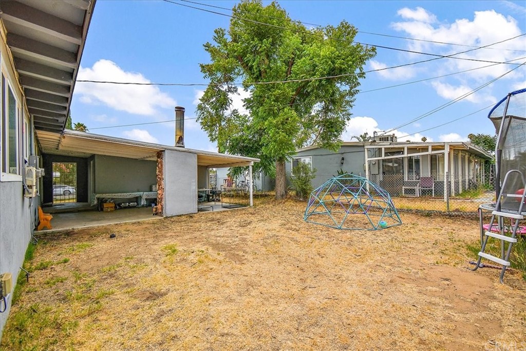 3510 McKenzie Street Riverside, CA 92503 - Photo 22 of 27 a view of a house with backyard porch and sitting area