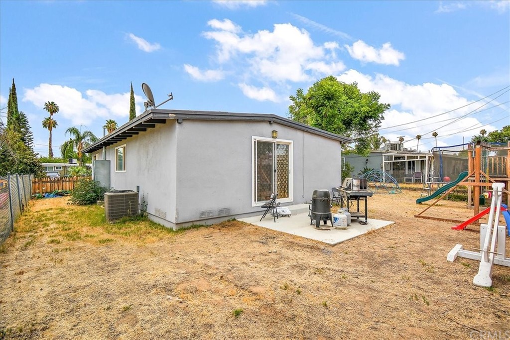 3510 McKenzie Street Riverside, CA 92503 - Photo 23 of 27 a view of a house with backyard porch and sitting area