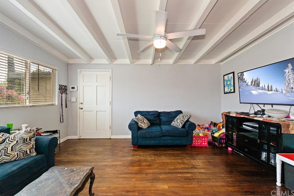 3510 McKenzie Street Riverside, CA 92503 - Photo 4 of 27 a living room with furniture and wooden floor