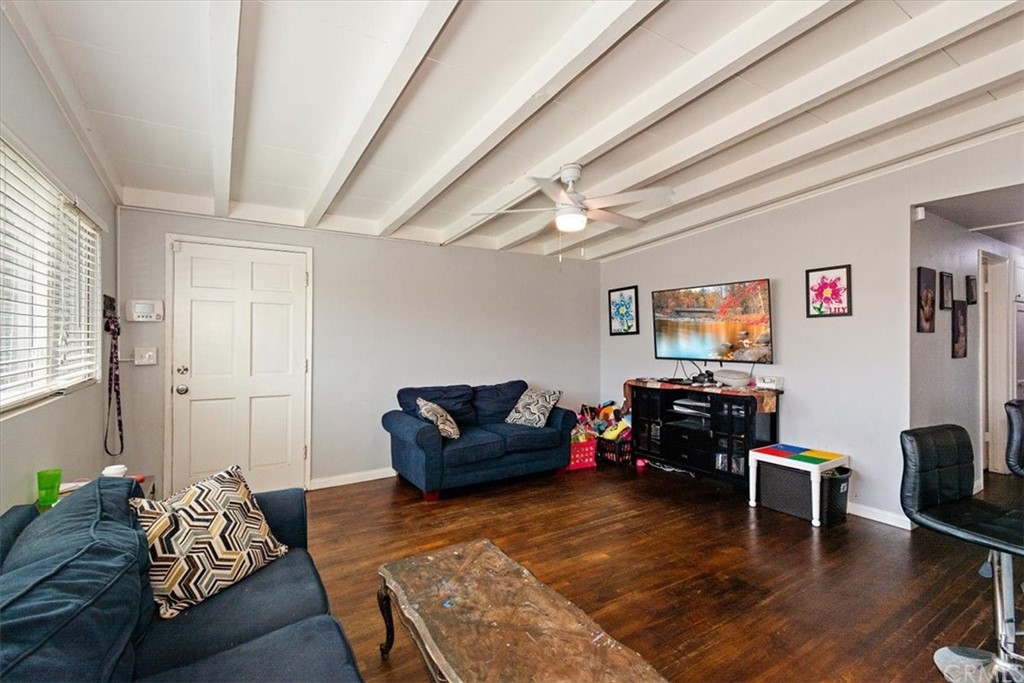 3510 McKenzie Street Riverside, CA 92503 - Photo 5 of 27 a living room with furniture and a flat screen tv