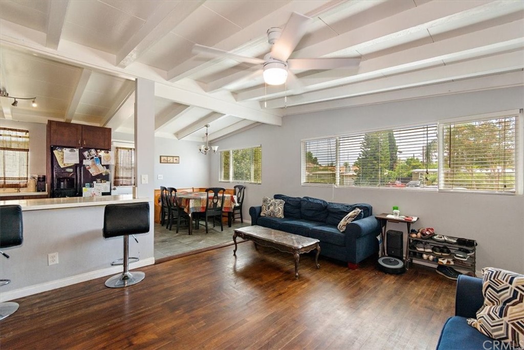3510 McKenzie Street Riverside, CA 92503 - Photo 6 of 27 a living room with furniture and a large window