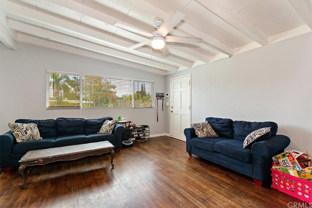 3510 McKenzie Street Riverside, CA 92503 - Photo 7 of 27 a living room with furniture and a large window