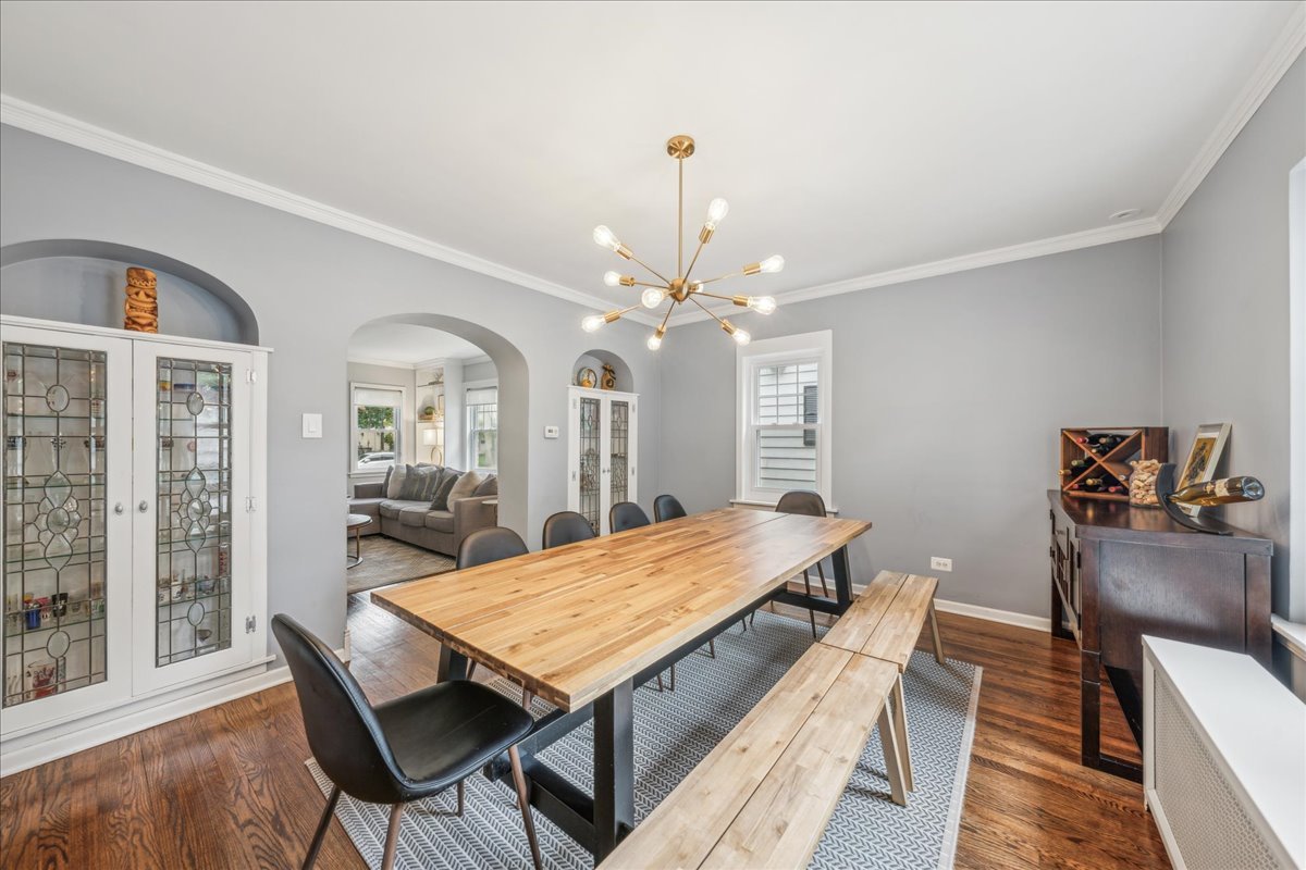 212 E Road Glen Ellyn, IL 60137 - Photo 15 of 42 a view of a dining room with furniture and wooden floor