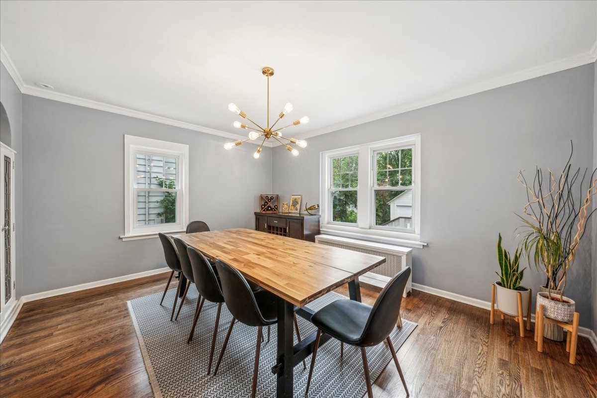 212 E Road Glen Ellyn, IL 60137 - Photo 30 of 42 a view of a dining room with furniture window and wooden floor