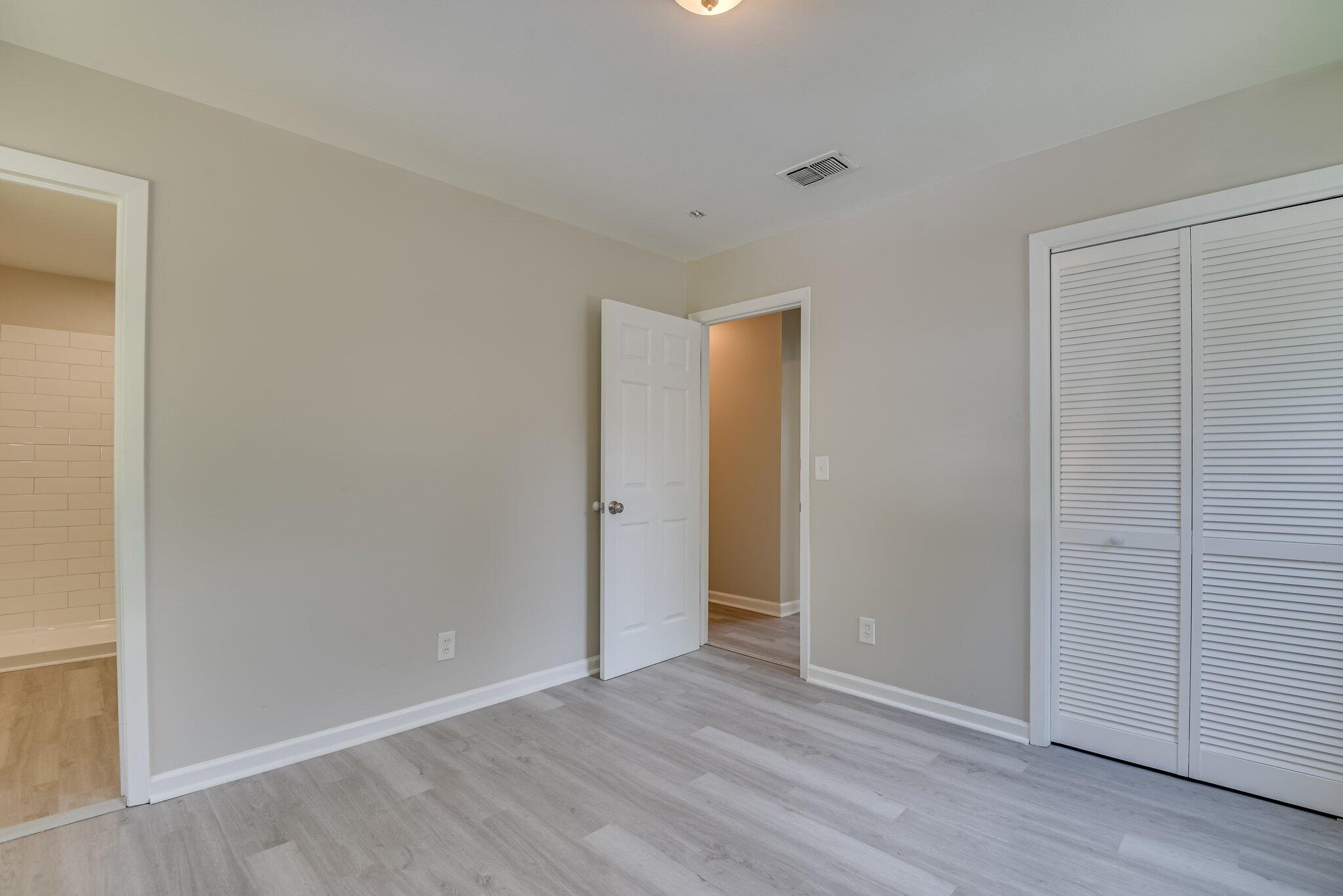 2115 Ashley Drive Augusta, GA 30906 - Photo 25 of 38 a view of an empty room with wooden floor