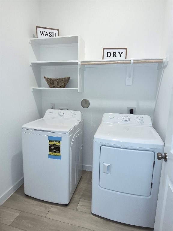 31007 Golden Felipe Street Fulshear, TX 77441 - Photo 17 of 19 a utility room with dryer and washer