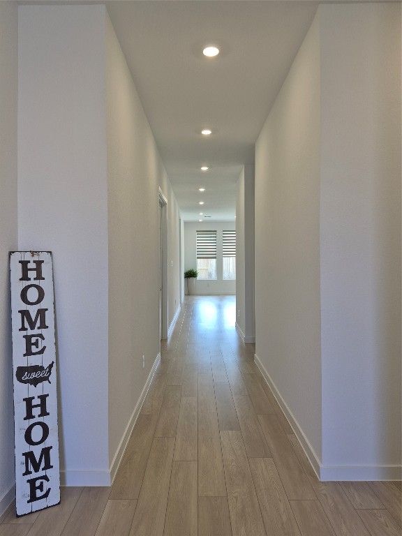 31007 Golden Felipe Street Fulshear, TX 77441 - Photo 4 of 19 wooden floor in a hall with a window