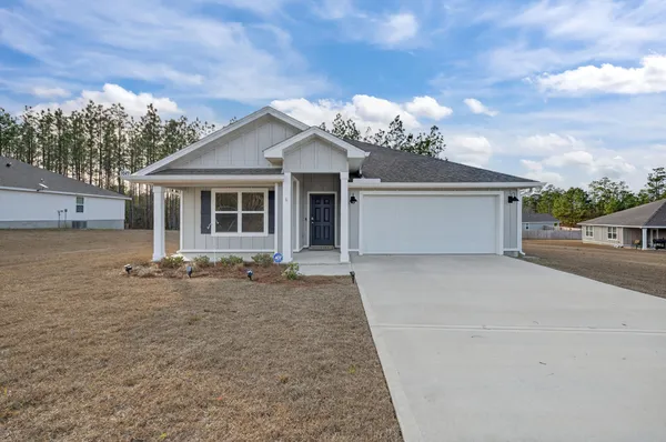 front view of a house with a street