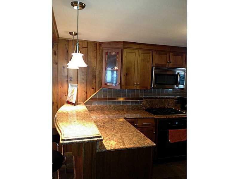 50 Kimball Corner Road Sebago, ME 04029 - Photo 10 of 25 Kitchen. Kitchen island bar