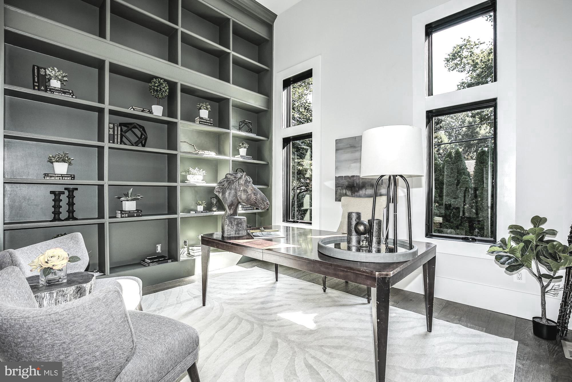 6160 Hardy Drive McLean, VA 22101 - Photo 14 of 41 a living room with furniture and a potted plant