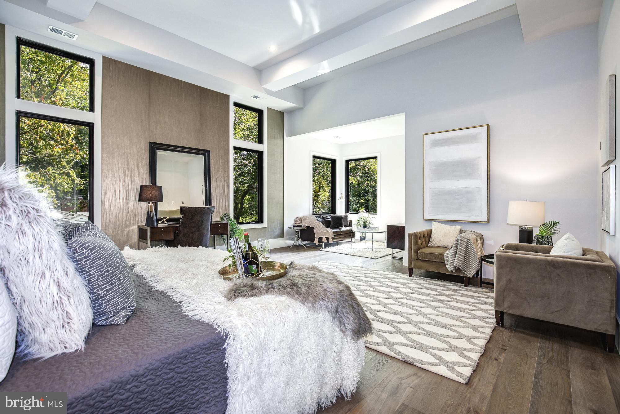 6160 Hardy Drive McLean, VA 22101 - Photo 18 of 41 a bedroom with a large bed and a large window