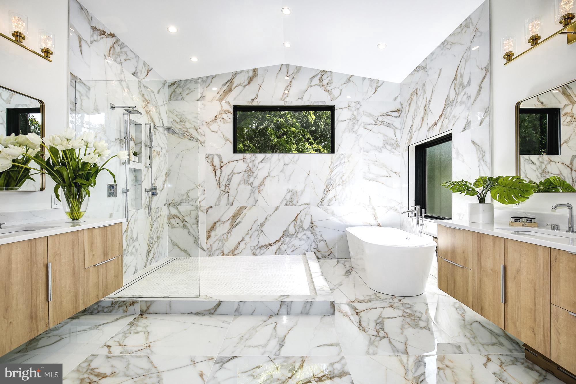 6160 Hardy Drive McLean, VA 22101 - Photo 19 of 41 a bathroom with a sink and a mirror