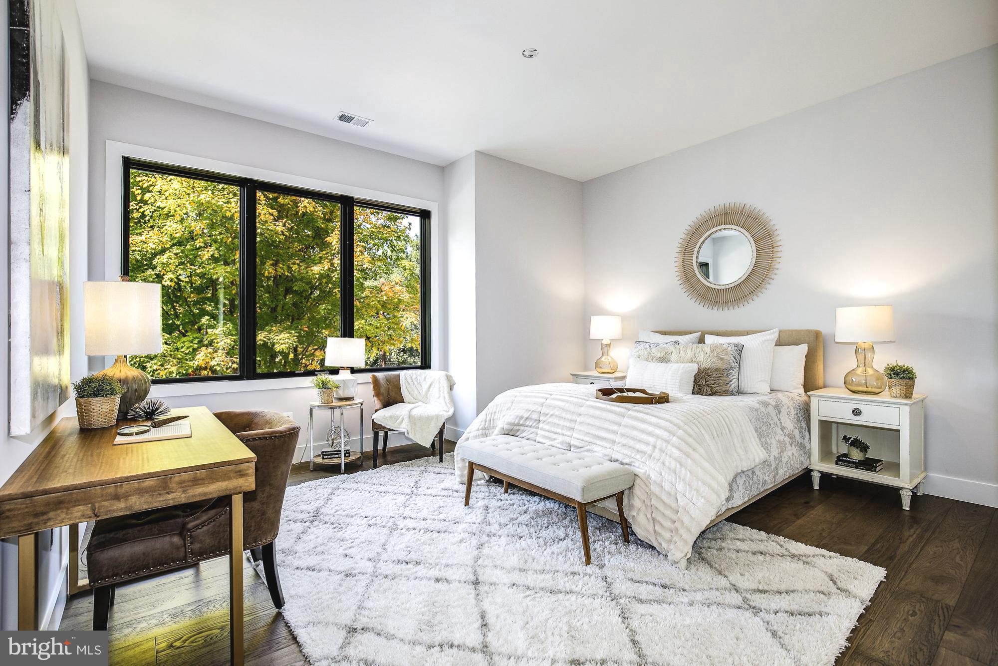 6160 Hardy Drive McLean, VA 22101 - Photo 25 of 41 a bedroom with a bed and a large window