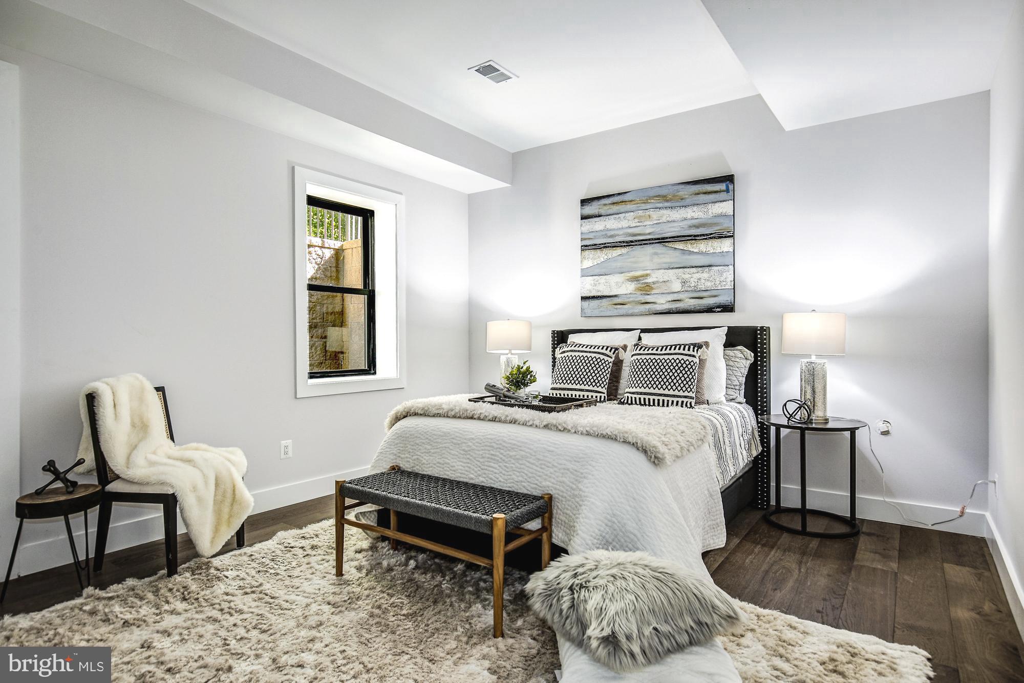 6160 Hardy Drive McLean, VA 22101 - Photo 32 of 41 a bedroom with a bed chair and window