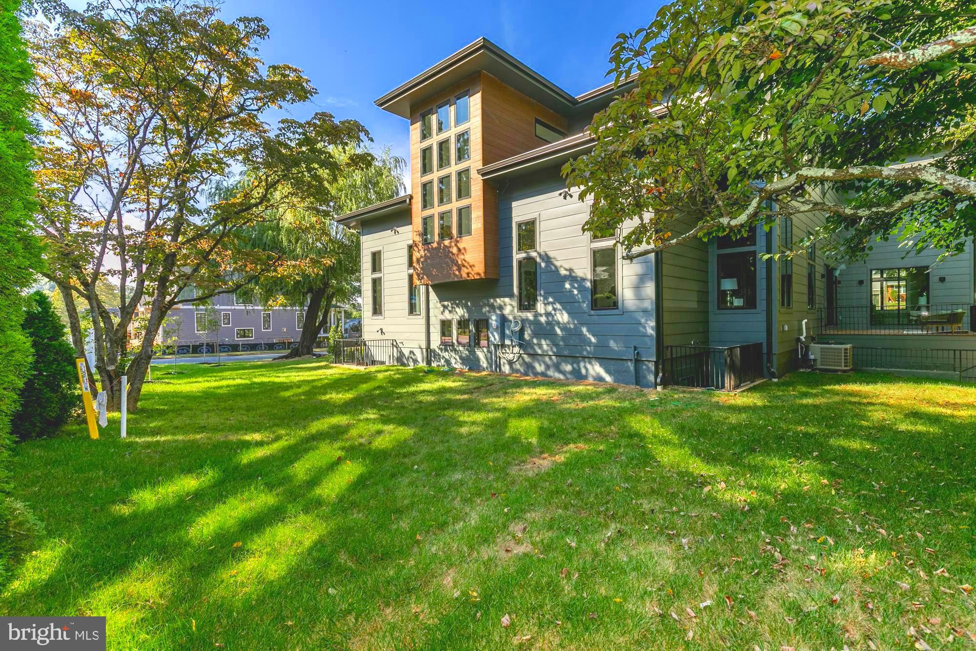 6160 Hardy Drive McLean, VA 22101 - Photo 38 of 41 a front view of a house with a yard