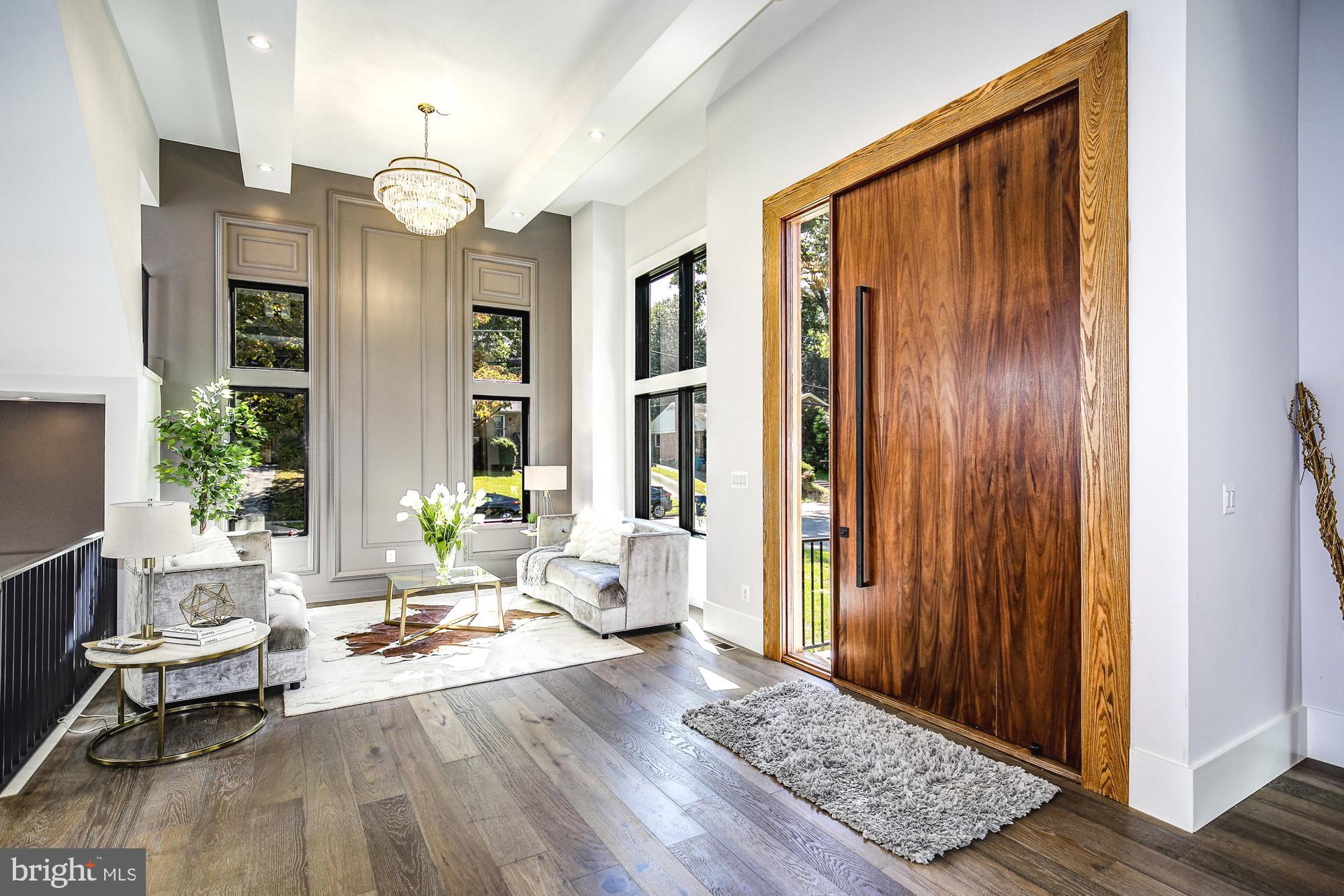 6160 Hardy Drive McLean, VA 22101 - Photo 5 of 41 a large living room with wooden floor